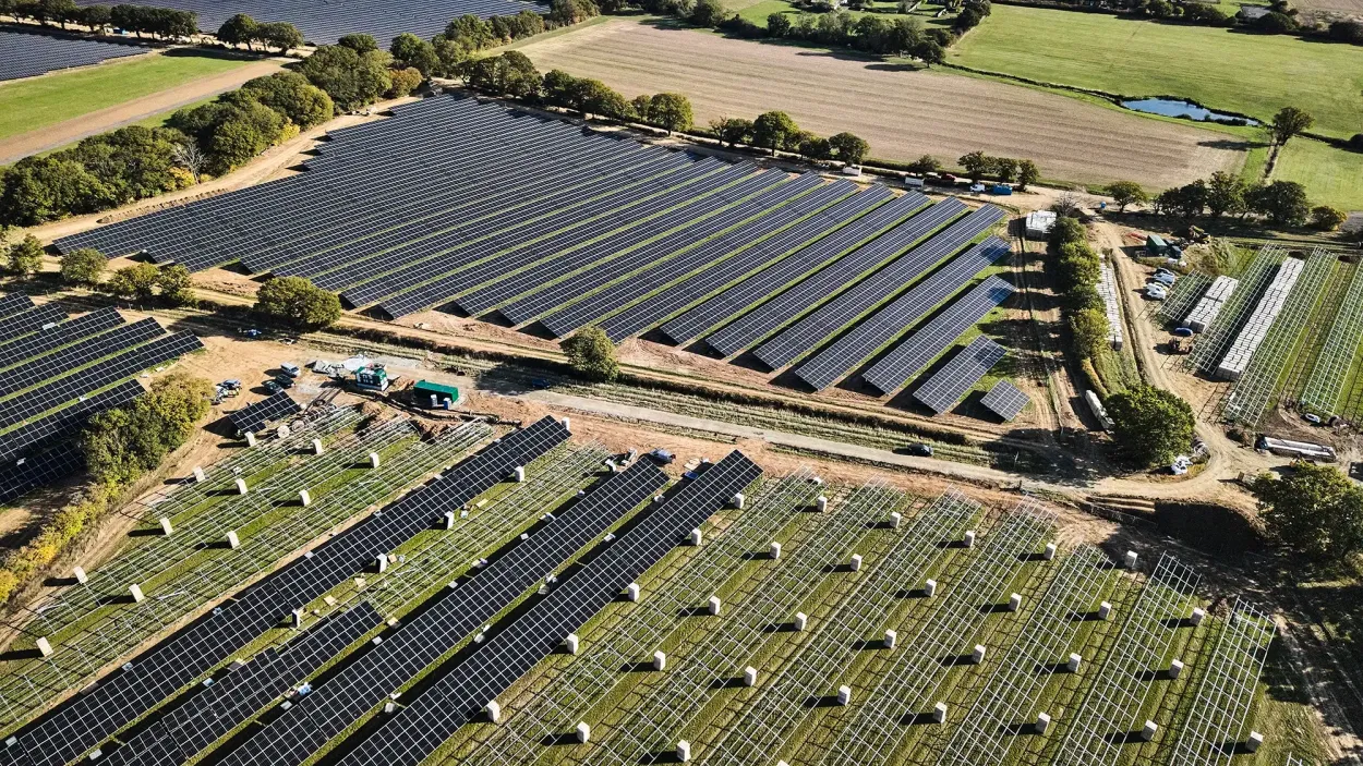 Fields of solar panels and solar panel frames
