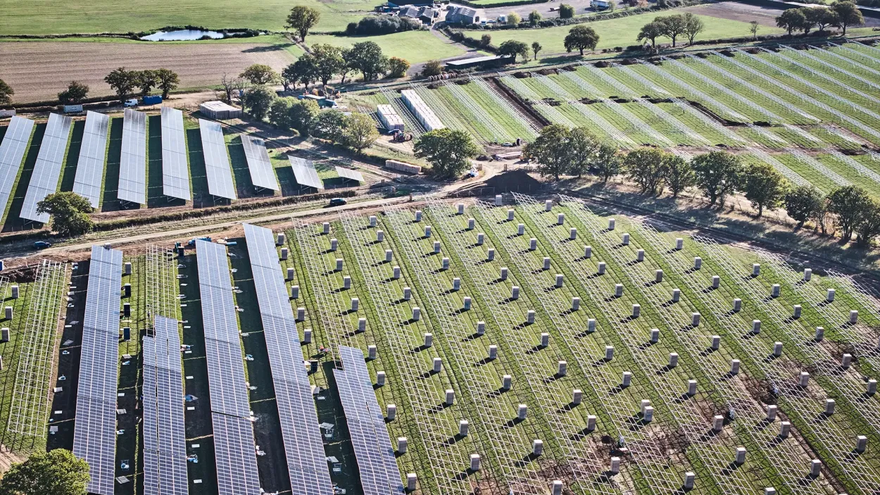 Fields of solar panels and solar panel frames