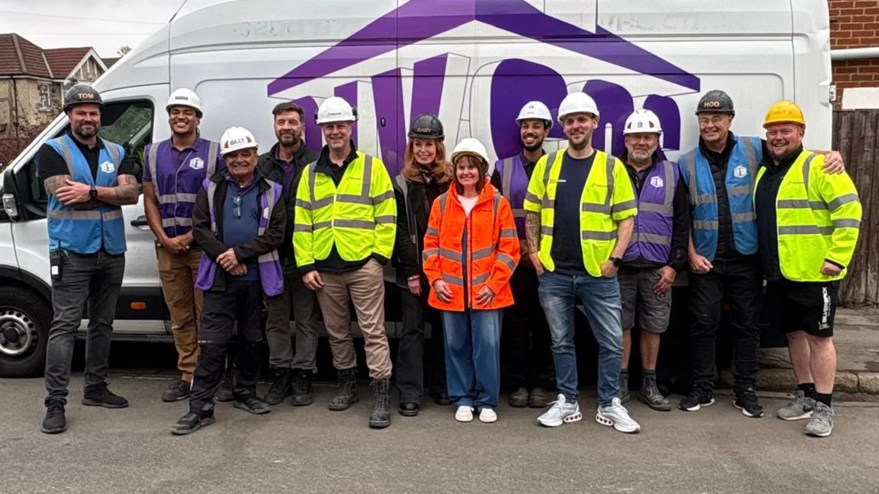 The team from BBC One's DIY SOS with Holcim volunteers