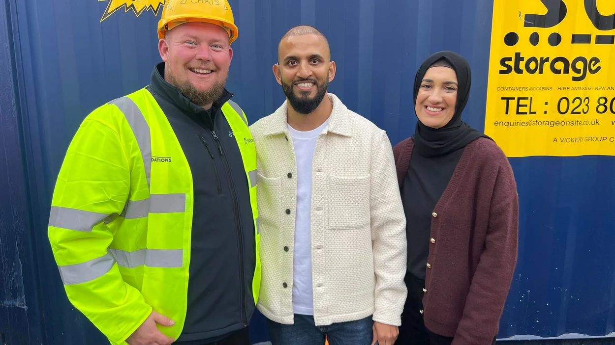 Chris Davdison with the Rifat family whose house he helped rebuild as part of DIY SOS