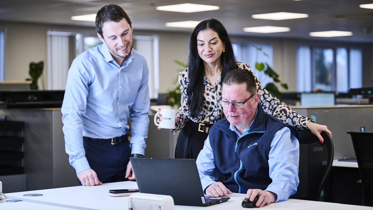 Rebecca Neeworth, Quanity Surveyor in Holcim UK's Contracting division at Bardon Hill offices with colleagues