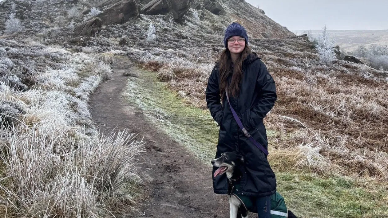 Apprentice Morgan Watson out walking her sheepdog Enfys