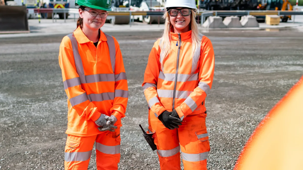 Apprentice Morgan Watson (left) in PPE at Sheffield Asphalt plant with a colleague