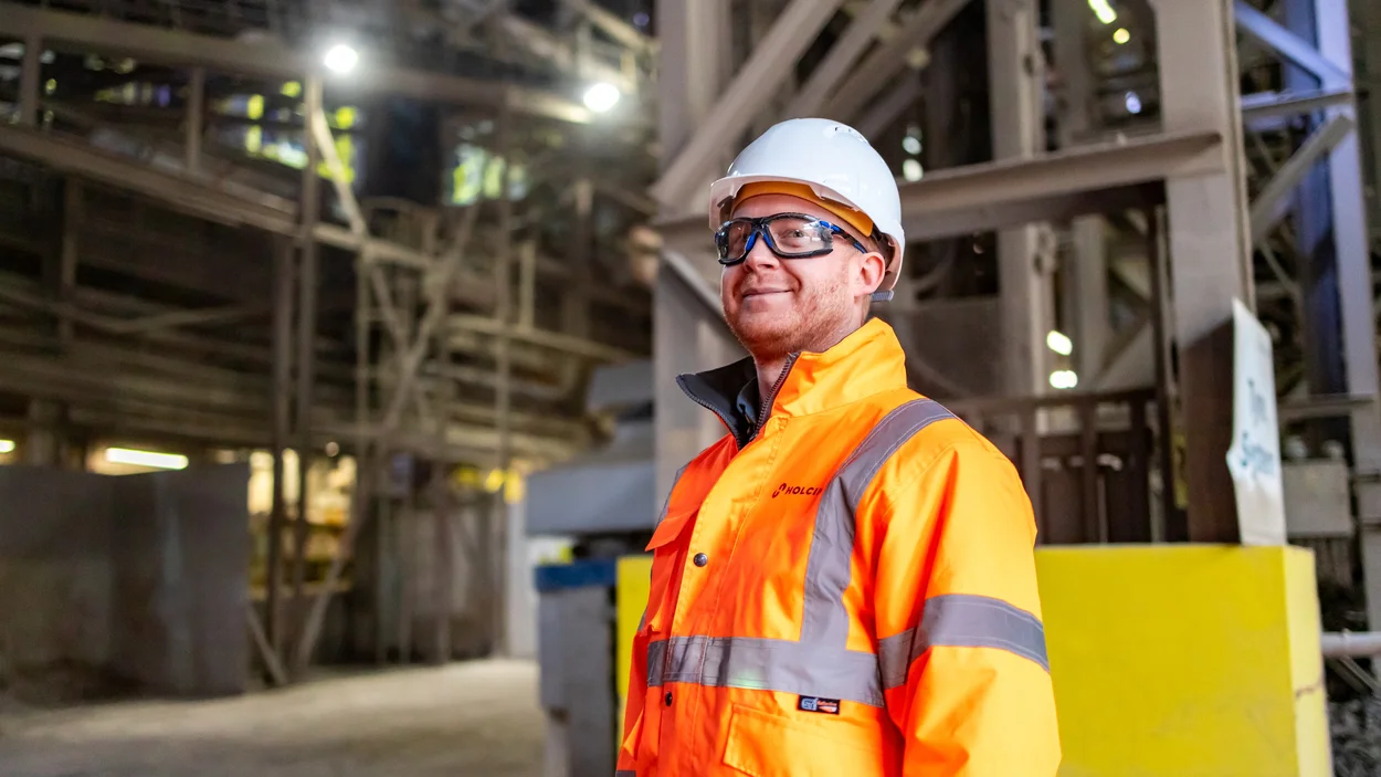Holcim UK Head of Sustainability Tom Redfern in high viz PPE at Cauldon Cement Plant