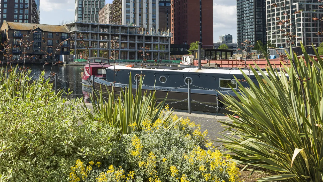 Wood Wharf skyline with a canal boat