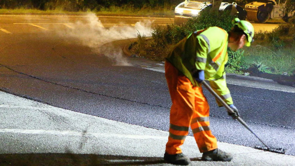 Worker manipulating Prolay into position