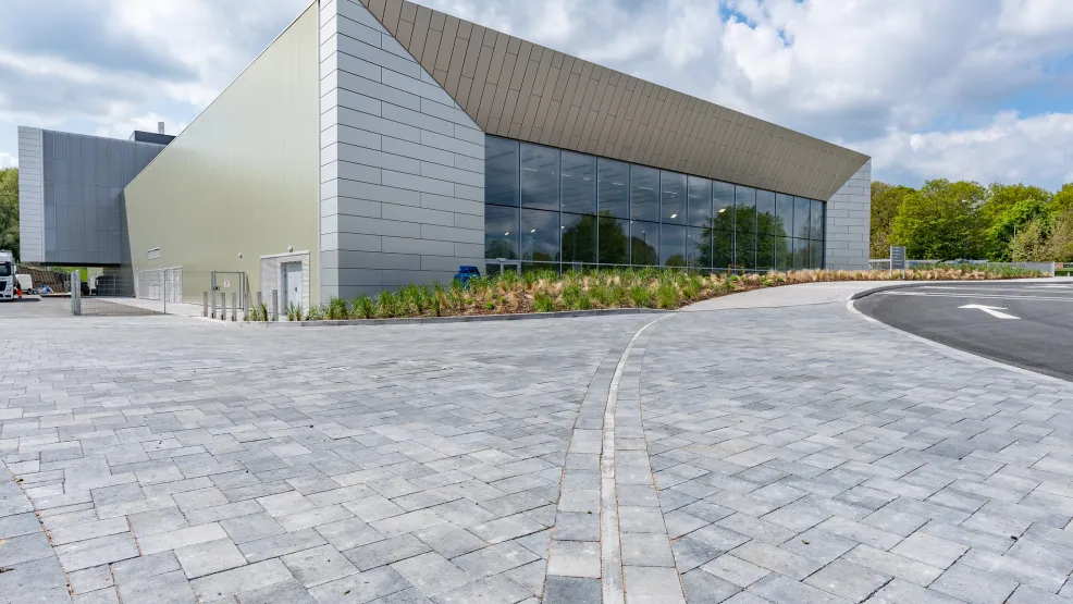 Front view of Moorways Leisure centre with Charcon paving