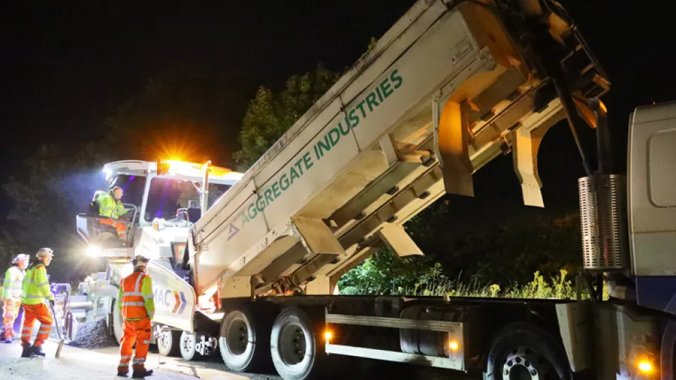 Laying asphalt on the A46 at night