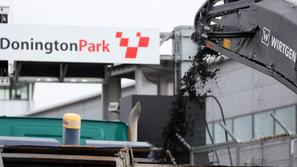 Feeding asphalt into a paver at Donington Park
