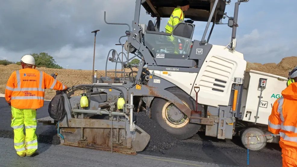 Paver laying asphalt on the A30