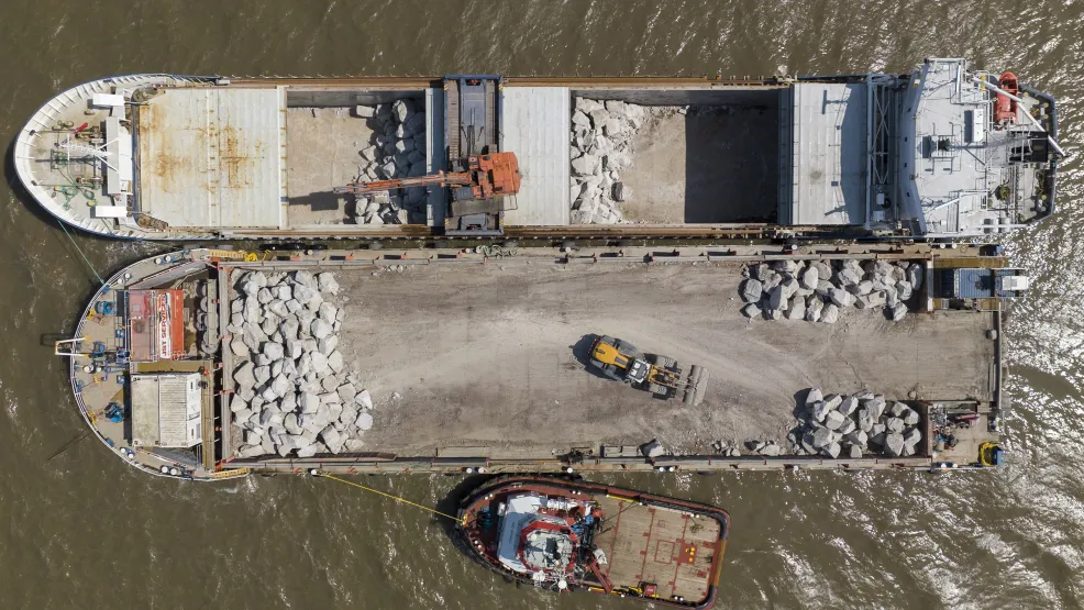 Top down image of the Hagland Saga boat next to the SeaRock barge and a tug boat on the Blue Anchor coast