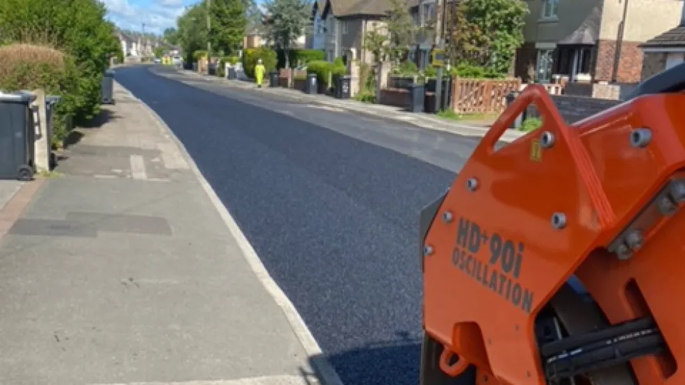 Roller going over freshly laid asphalt