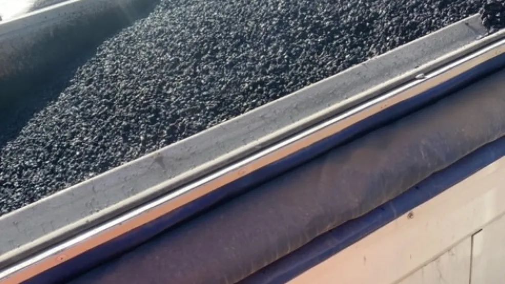 Asphalt in the back of a tipper truck