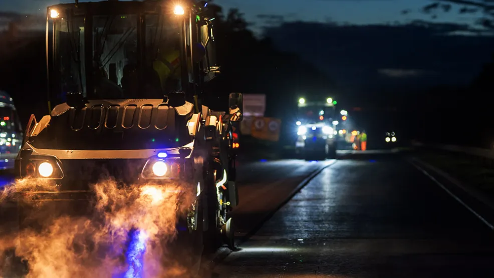 Roller flattening asphalt towards the camera on the A90