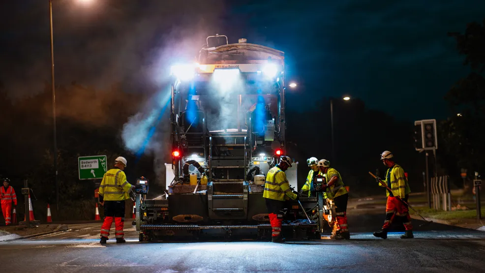 Paver and workers paving the A444 Griff Island near Nuneaton