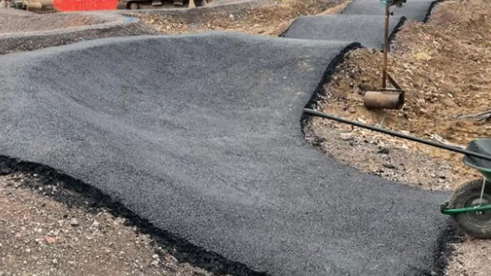 pump track with machinery around it