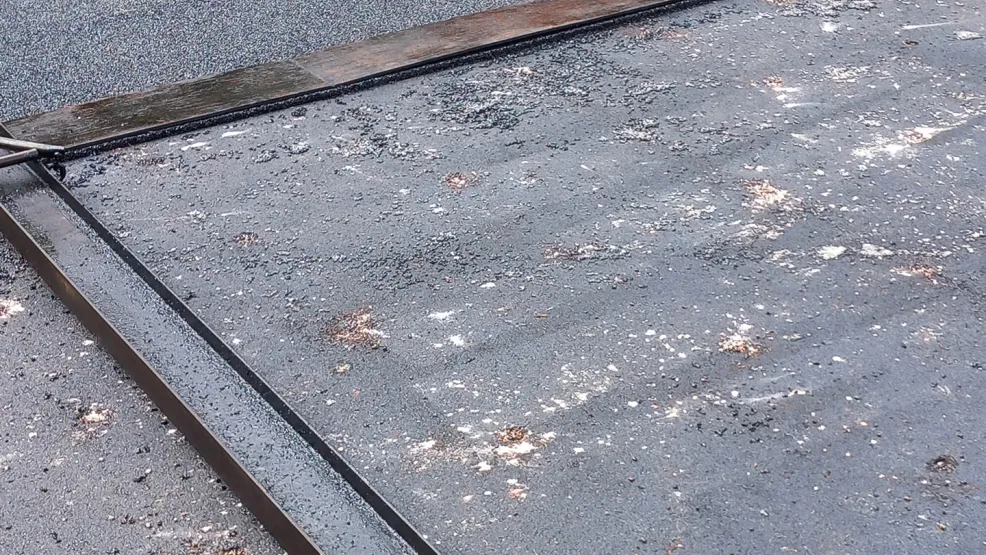 Roller next to resurfacing tramlines