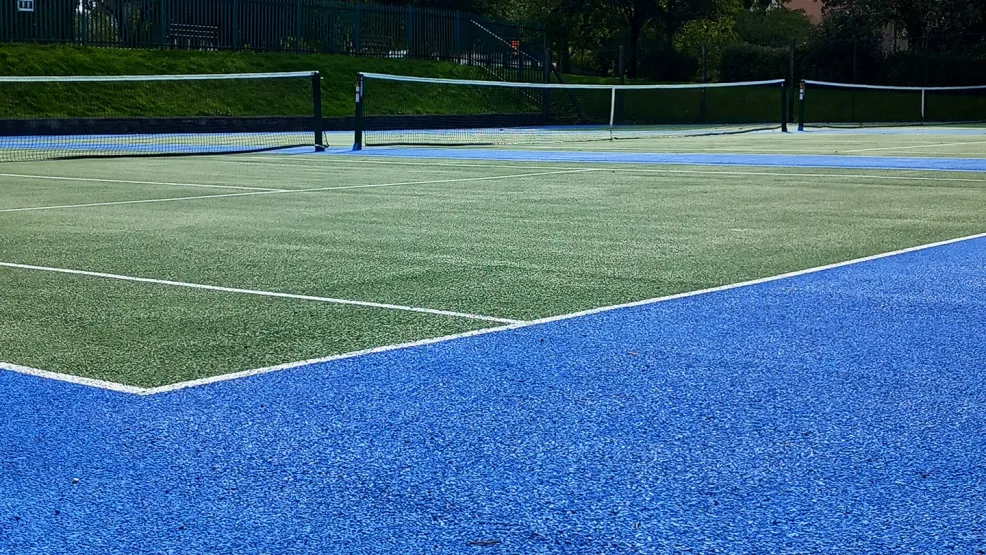 Finished tennis court at Oakhill, image taken from close to the ground