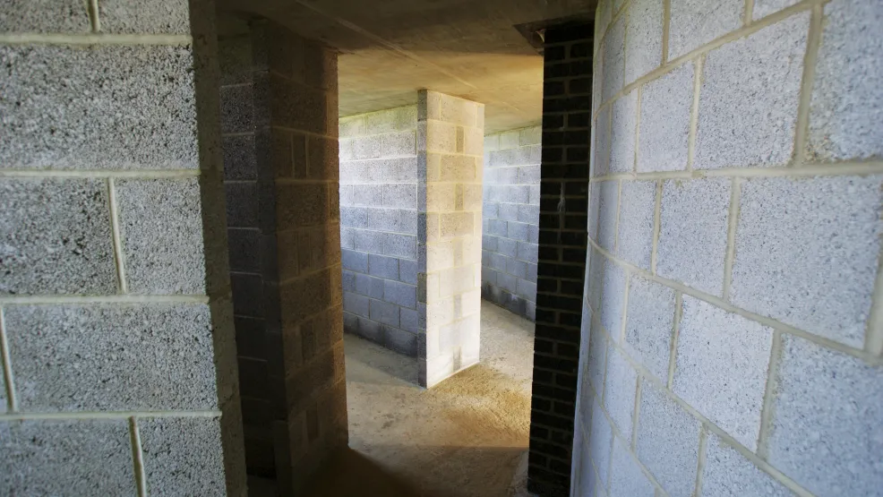 Building walls showing exposed concrete blocks