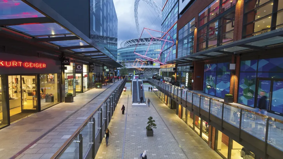 Shopping Centre at twilight with o2 stadium in the background