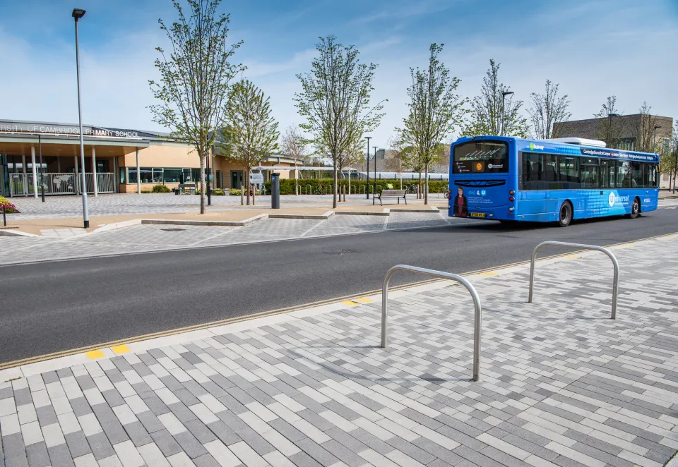Charcon Eco Countryside Kerb with Stonemaster paving and a bus