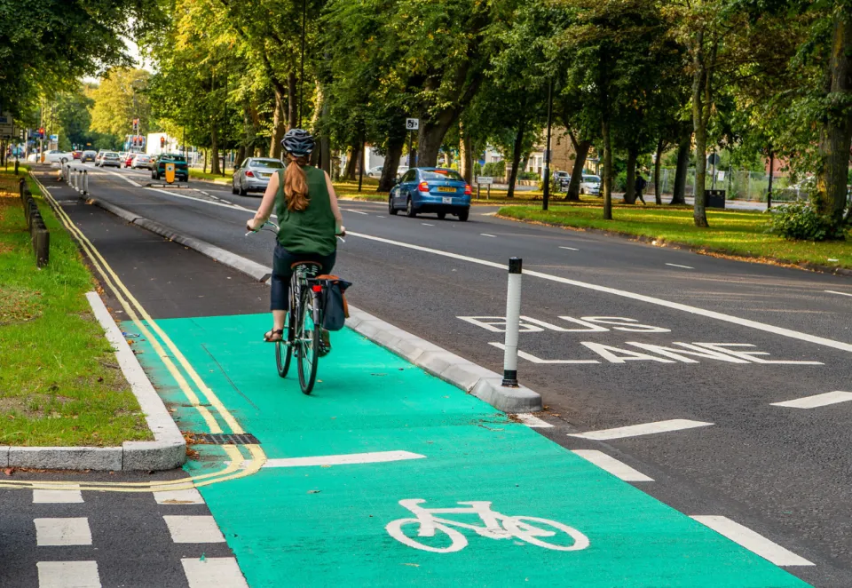 An image of a cycle lane featuring charcon cycle kerbs on a busy road