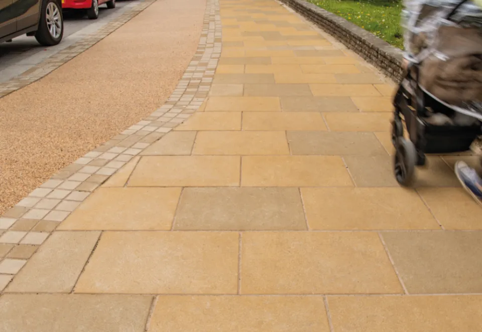 a picture of stonemaster in buff laid on a pavement in a checkboard pattern