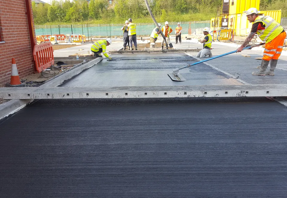 PPE workers working concrete