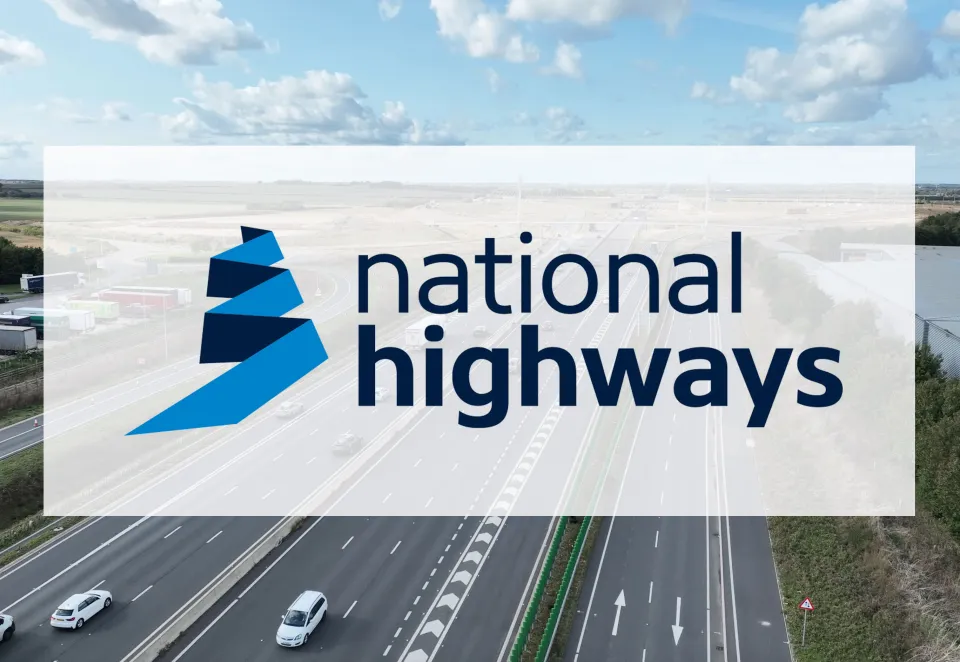 National Highways logo with a motorway in the background