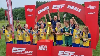 Adam Kutcher with the St Alban's Lionesses team he coached.