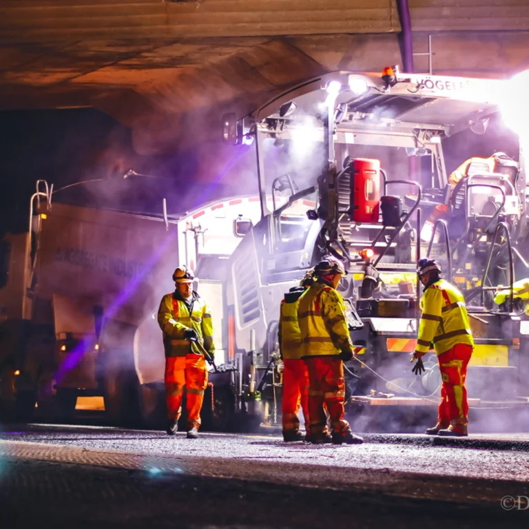Construction workers resurfacing the M1 motorway at Junction 13.