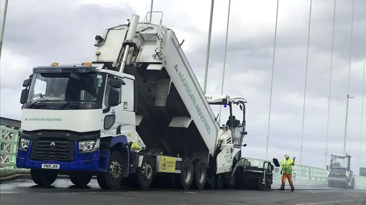 Aggregate Industries truck unloading on a bridge