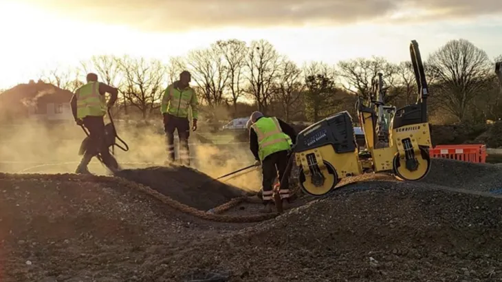 Sullivan Pump Track being paved at dawn