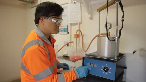 A technician carries out asphalt product testing at the Moordale Technical Centre at Hulland Ward