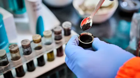 Testing being carried out in the lab at Cauldon Cement Plant