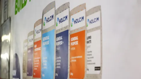 Poster showing Holcim Bagged Cement lined up next to each other