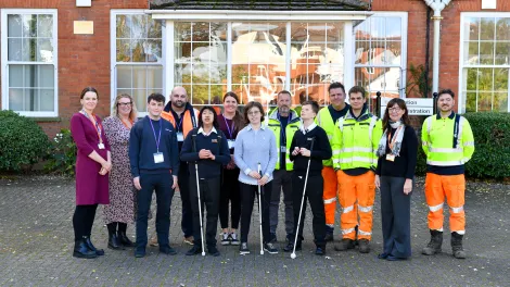 Pupils and staff join together at New College Worcester celebrate improvements to the school grounds.ol. Materials were donated by Aggregate Industries to carry out improvement works to the grounds.