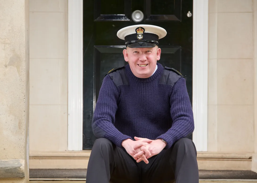 Petty Officer Chris Willett of the Navy Reserves in his uniform outside Aggregate Industries's group HQ