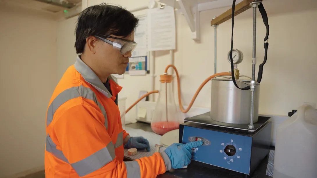 A technician carries out asphalt product testing at the Moordale Technical Centre at Hulland Ward