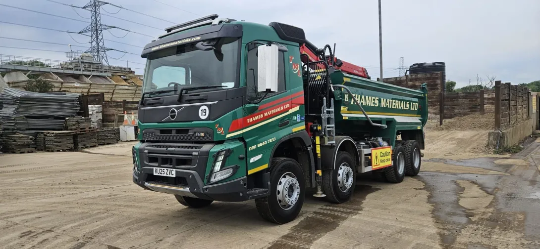 A Thames Material grabber truck