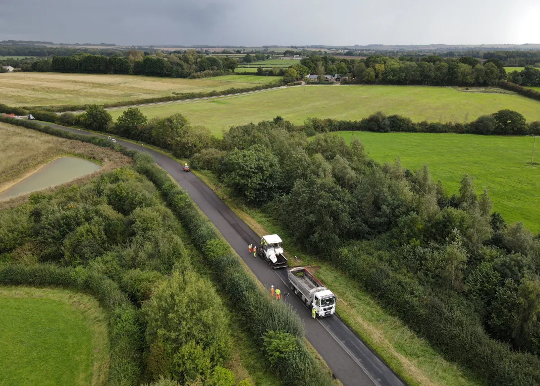 An aerial view of an ongoing road project led by OCL Regeneration, a member of Holcim