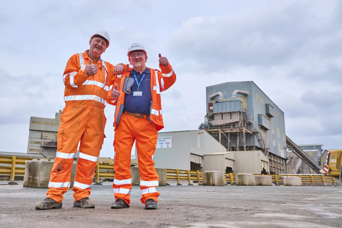 Ian "Speedy" White and Graham "Lou" Robinson thumbs up to 50 years service at Holcim UK's Bardon Hill Quarry