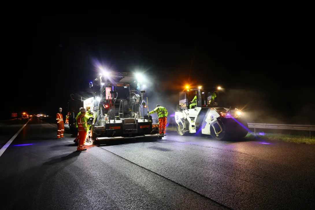 Road resurfacing equipment on the M5 motorway as part of night works carried out by Holcim UK