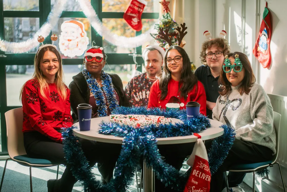 Colleagues at the Brentford office in London enjoying a Christmas celebration in the office.