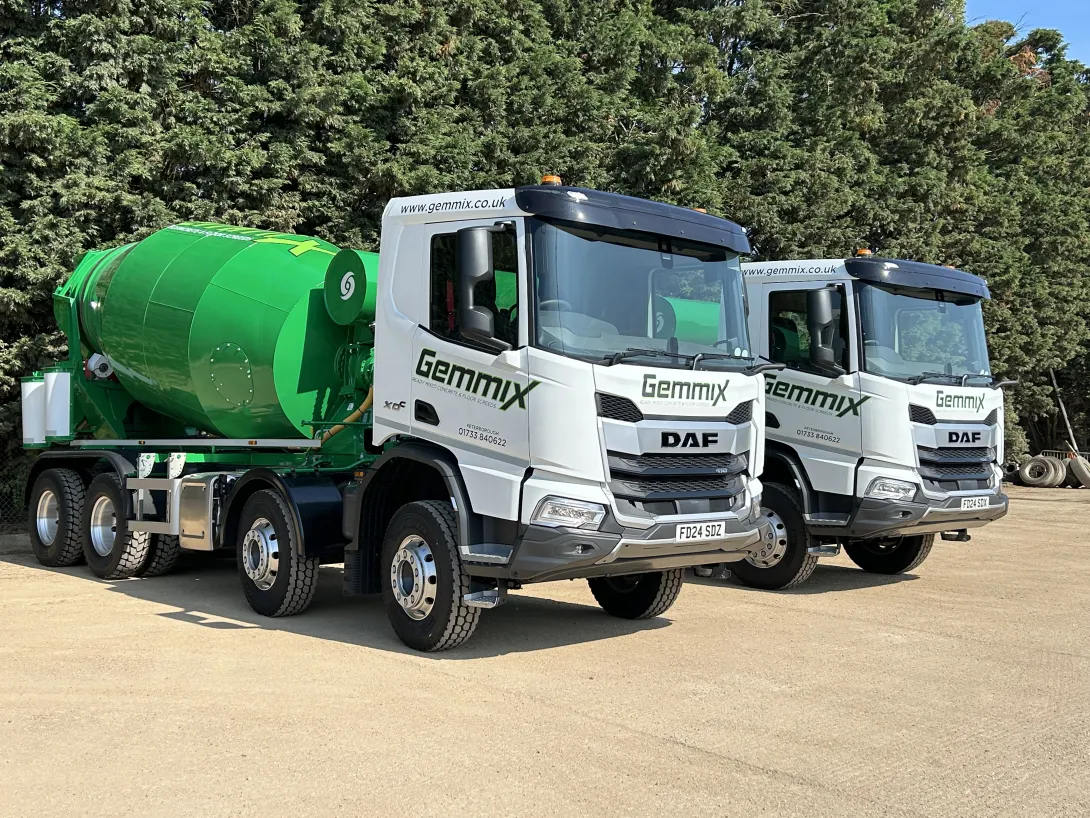 Two Gemmix Ltd mixer trucks. The company has been acquired by Holicm alongside PJ Thory Ltd.
