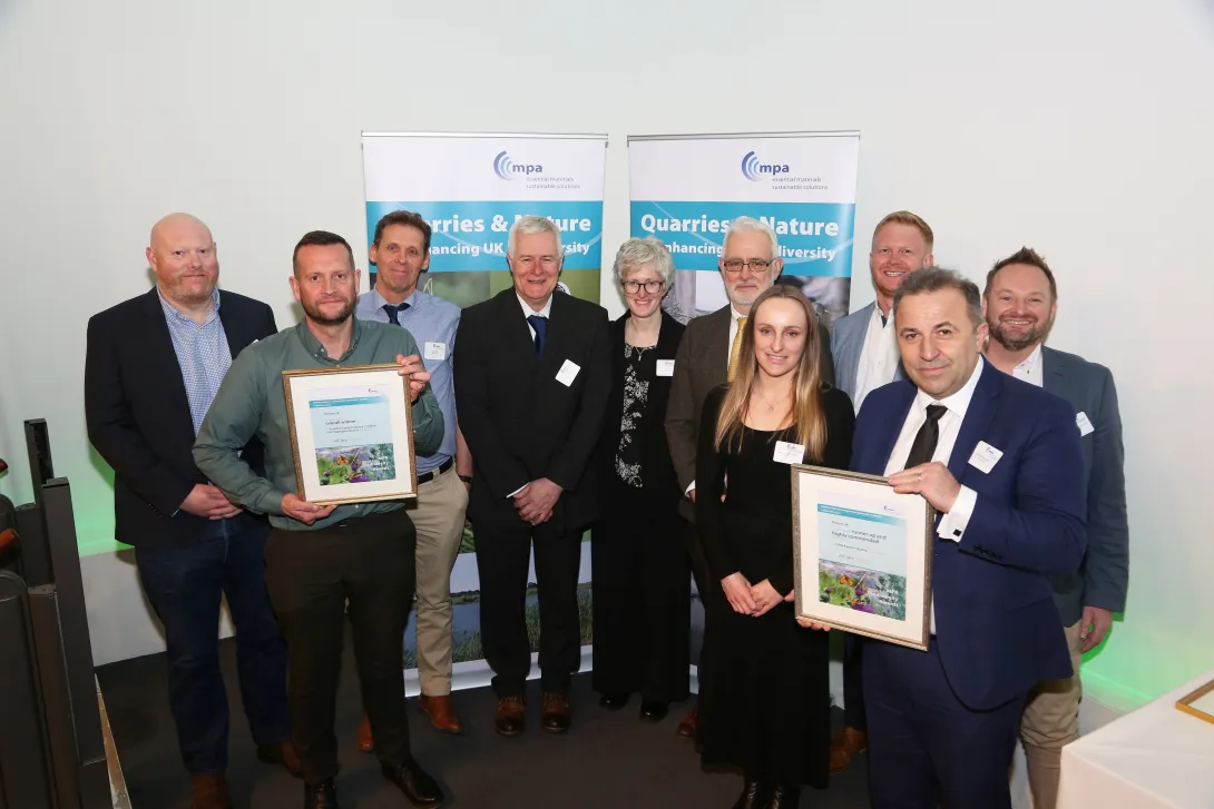 Reprsentatives from Holcim UK with two awards from the MPA Biodiversity Awards