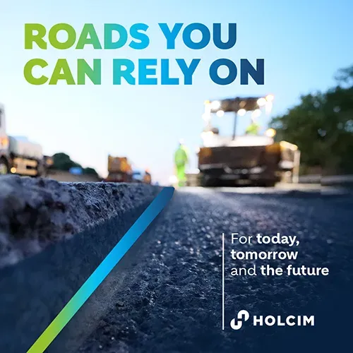 asphalt road with the text 'roads you can rely on'