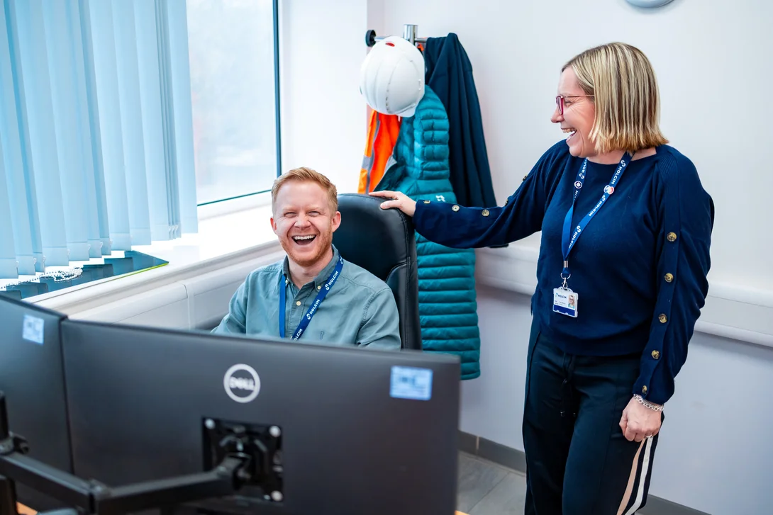 Holcim UK Head of Sustainability Tom Redfern with a colleague in the offices at Cauldon Cement