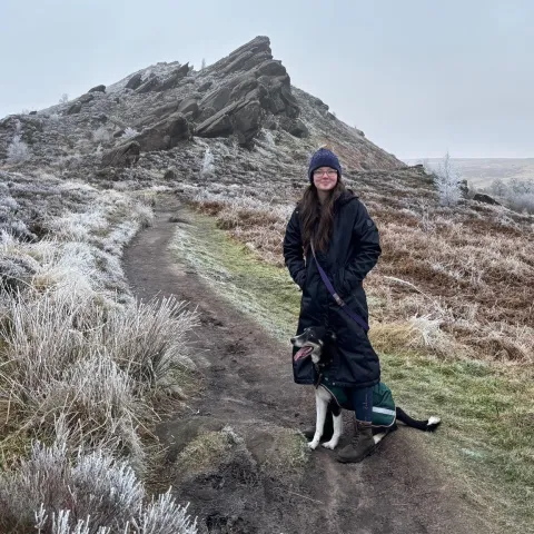 Apprentice Morgan Watson out walking her sheepdog Enfys